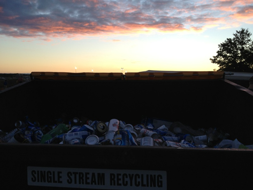 Volunteers filled a single stream recycling dumpster with recyclables collected during tailgating